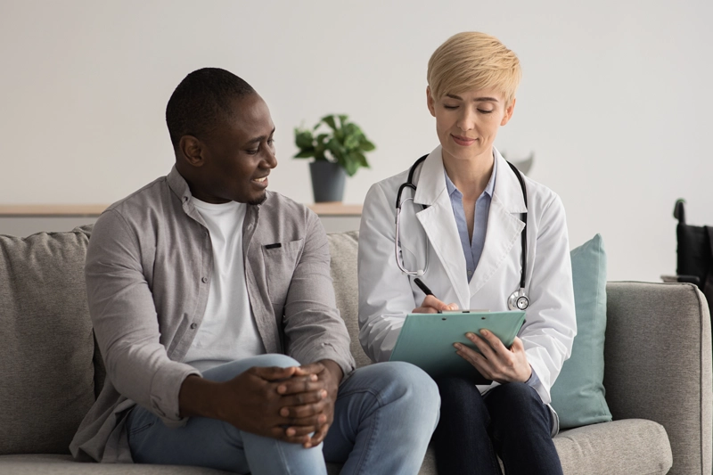 Doctor meeting with potential Phase 1 clinical trial participants at Equity Medical, clinical research centers in New York and Kentucky