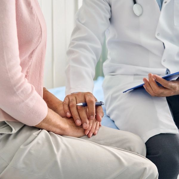 Clinician reviewing care options with a patient participating in urinary incontinence clinical trials in New York and Bowling Green, KY