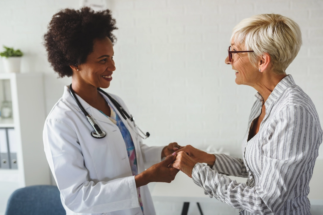 Equity Medical doctor discussing memory health and Alzheimer’s clinical trial options with a senior patient in New York City or Bowling Green, Kentucky