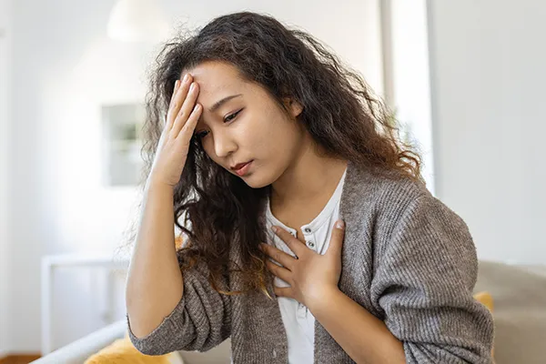 Common epilepsy symptoms such as dizziness and discomfort shown in patient exploring clinical trials with Equity Medical