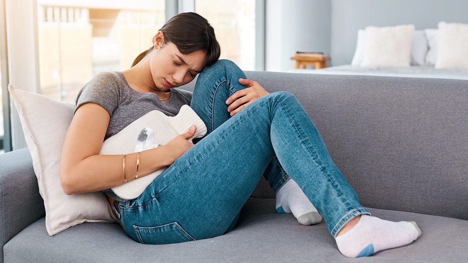 Woman with pelvic pain associated with polycystic ovary syndrome (PMOS) during Equity Medical nationwide clinical trials research.
