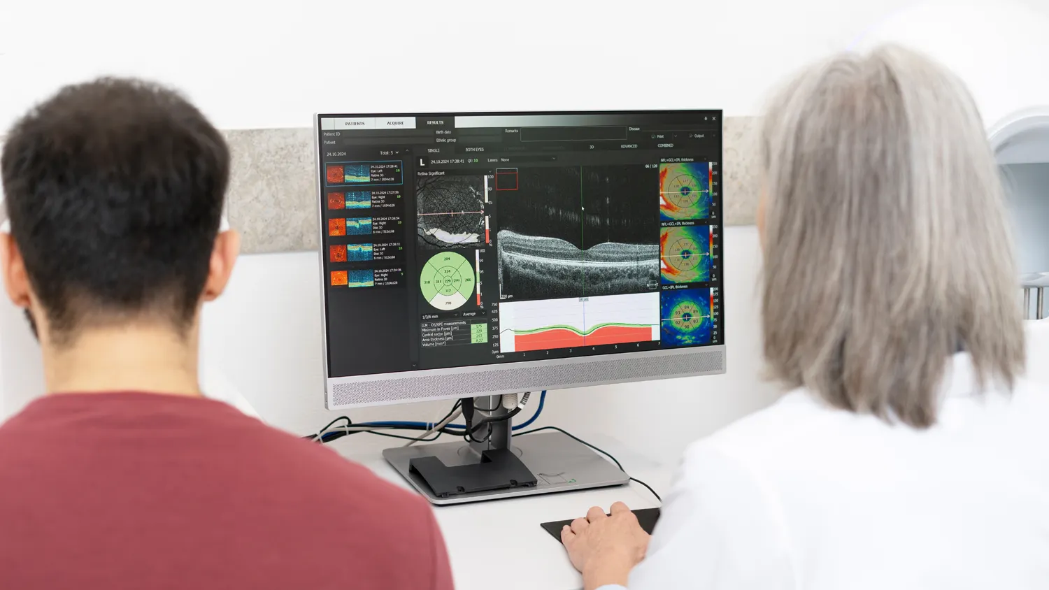 Doctor reviewing glaucoma diagnostic imaging for clinical trials at Equity Medical.