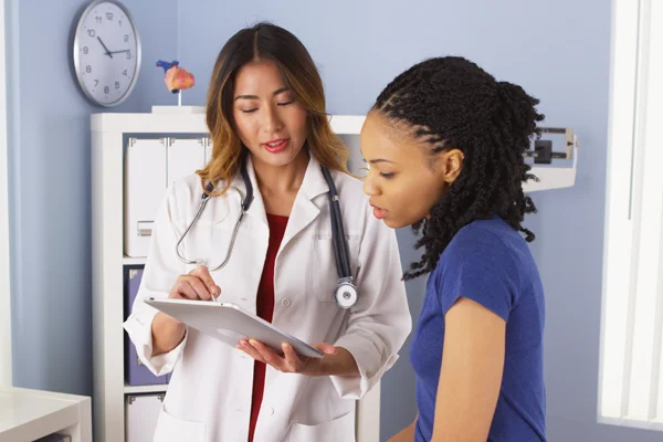 Patient consultation for vulvovaginal candidiasis clinical trials at Equity Medical.