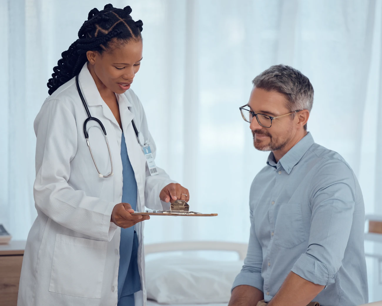 Patient learning about the Recommend a Friend program at Equity Medical