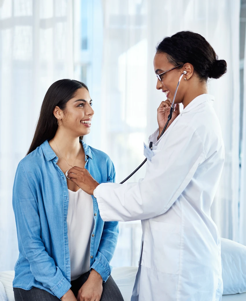 Doctor discussing women’s health clinical studies with a patient at Equity Medical in Owensboro, KY.